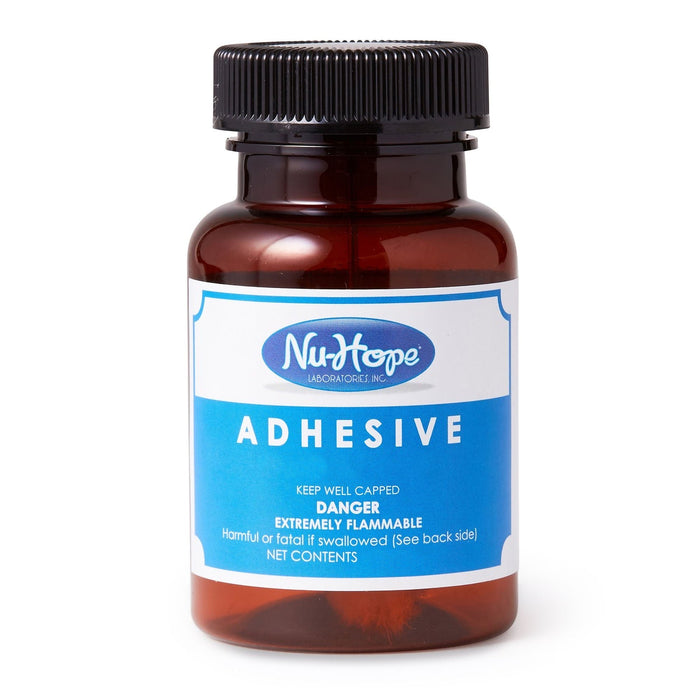 Nu-Hope Ostomy Adhesive 2 oz bottle front